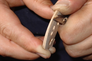 Ilja Grawert Violin Maker cutting a Violin bridge