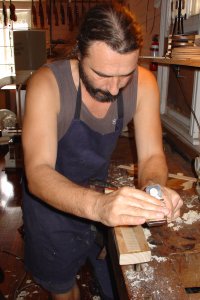 Ilja Grawert Violin maker planes a Violin rib